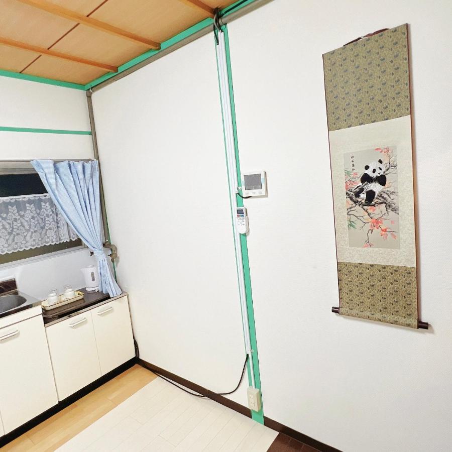 花月荘 Apartment Osaka Bagian luar foto